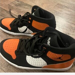 Air Jordan Black and Orange High-Top Sneakers for  men  size 9